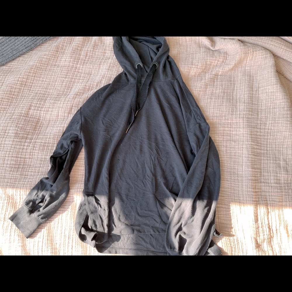 black hoodie with gold ended string & side slits